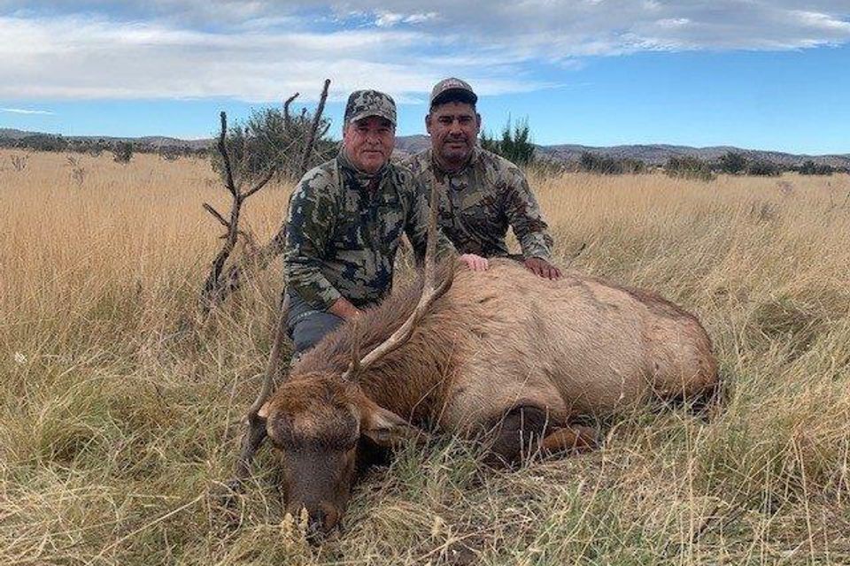 Gary stewart and guide tim with gary's club bull 2021