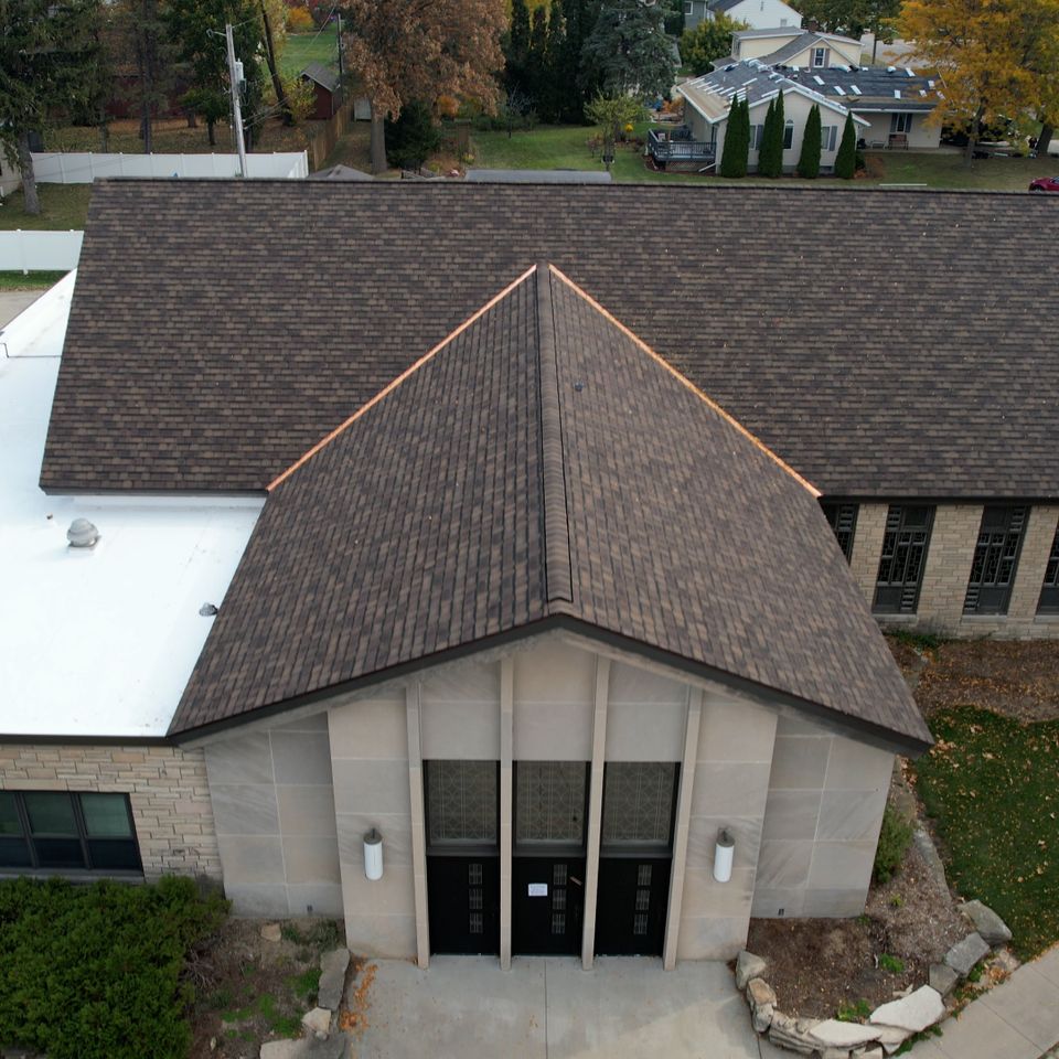 Roofing contractor appleton wi church shingle replacement camelot gaf designer shingle flat tpo commercial roof replacment