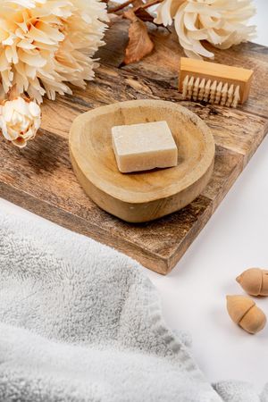 Spa with soap bar ans scrub brush