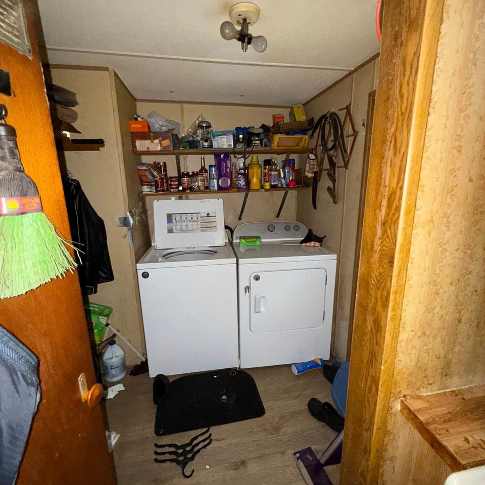 A washer and dryer getting prepared to be transported by JNJ Hauling Solutions of Citrus County