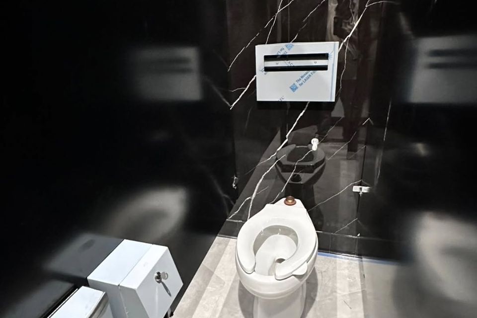 The inside view of a bathroom stall done by Pabst Leyton