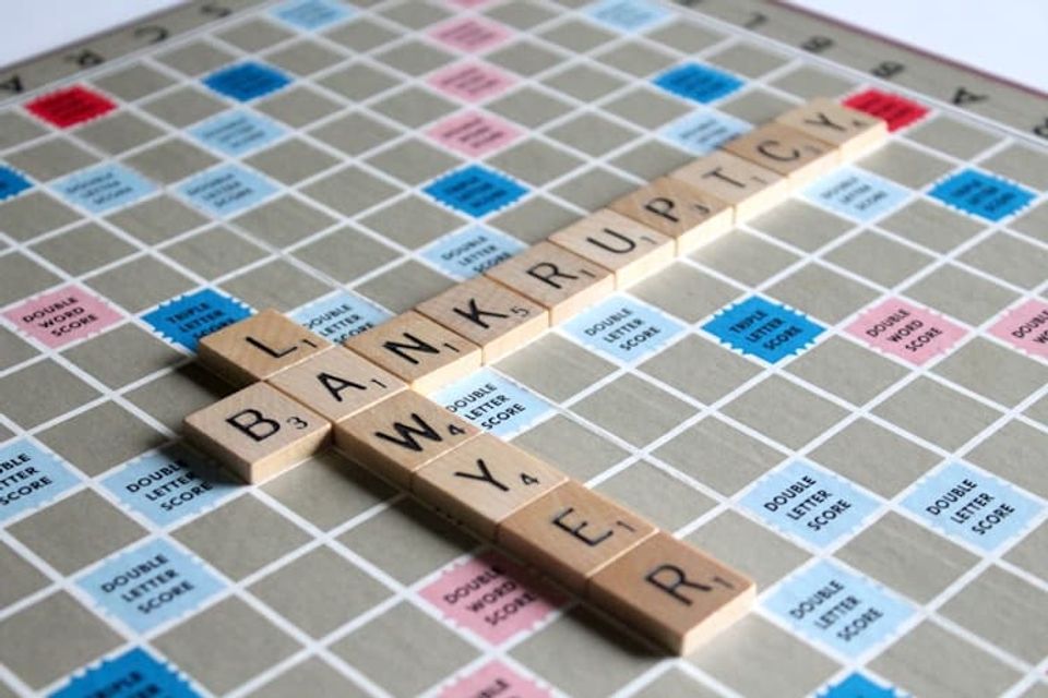 bankruptcy lawyer spelled out on Scrabble board