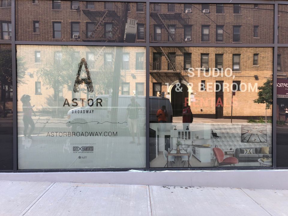 Printed window vinyl graphics for Astor Broadway covering a storefront window