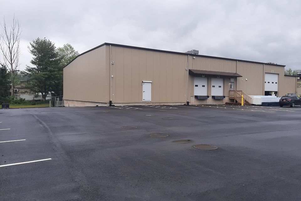 Industrial warehouse with loading docks for commercial storage solutions.