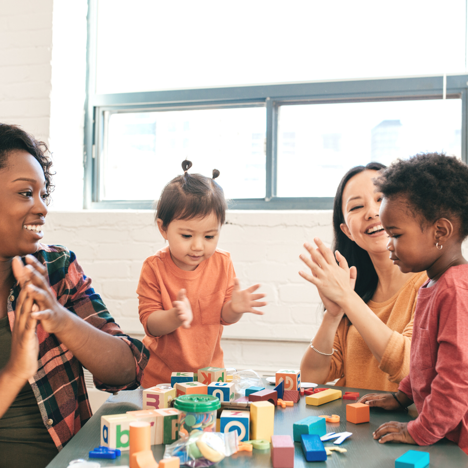 Two teachers with two 2 year olds