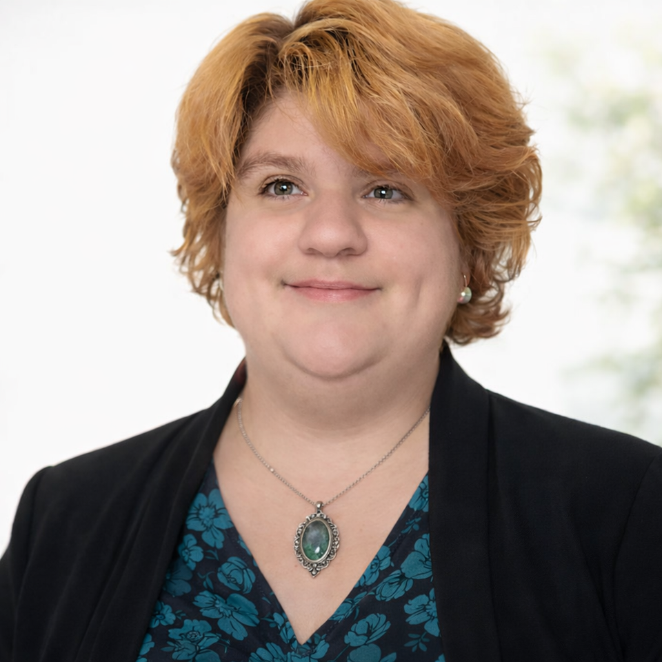 Gentle smile in soft sunlight