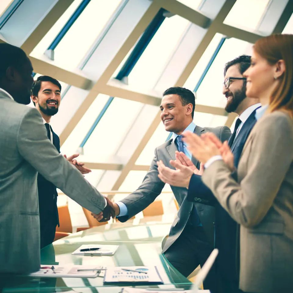 Happy clients, shaking hands