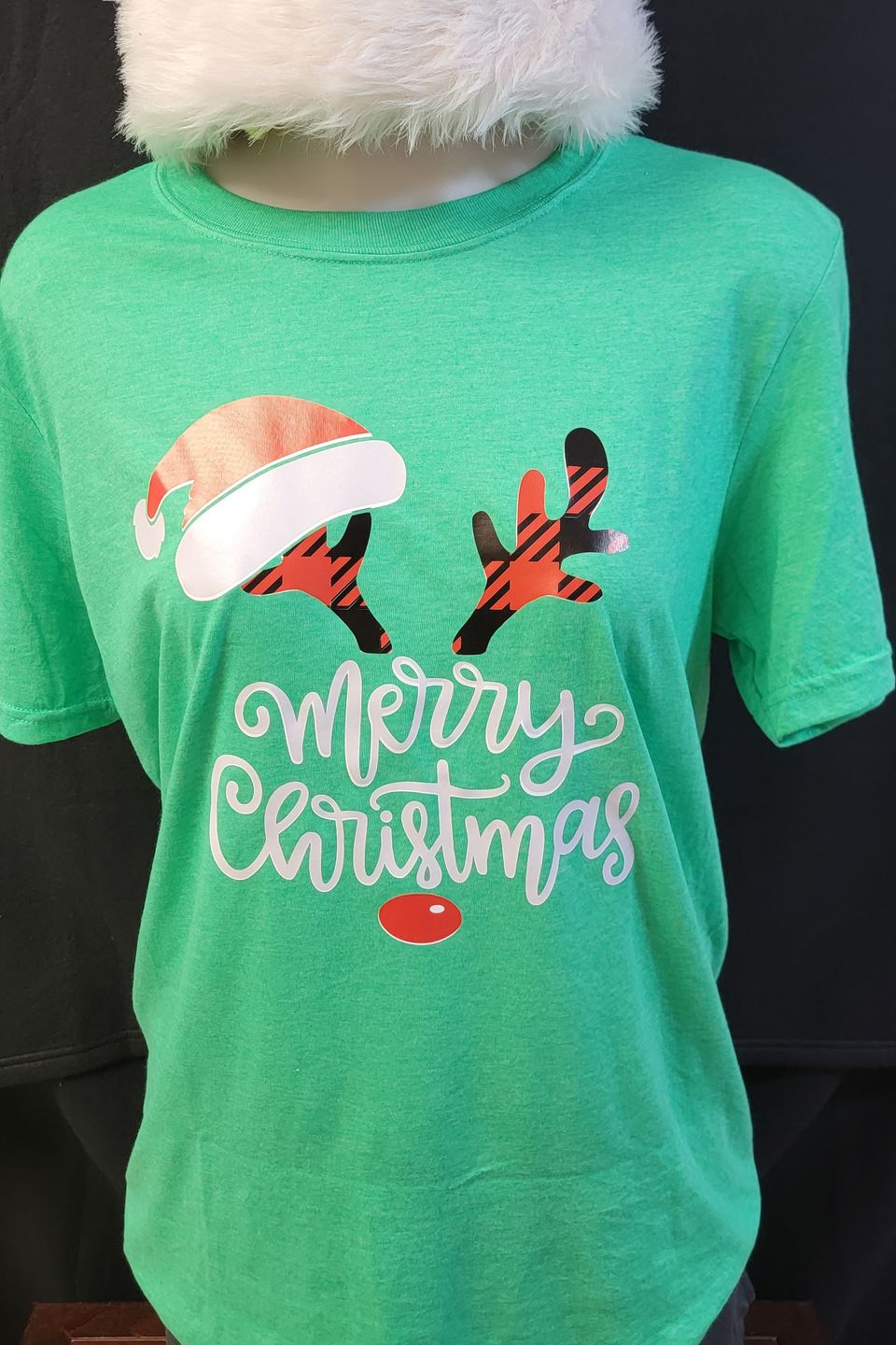 "DTF Direct-to-Film" example from SaRi's Creations - "Merry Christmas" with antlers on a green t-shirt