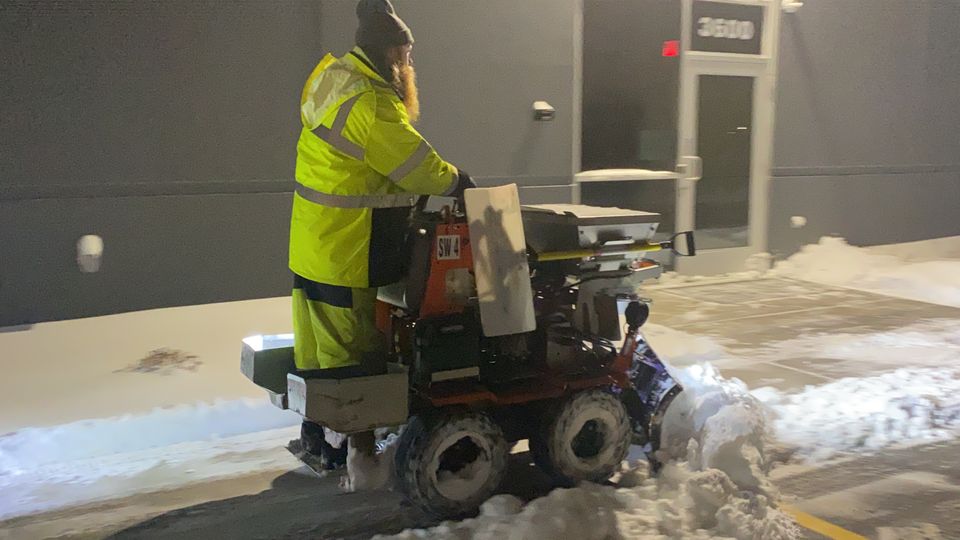 Commercial sidewalk clearing shoveling