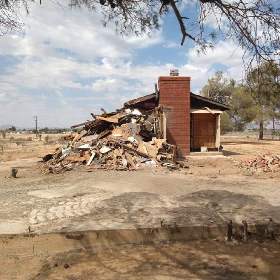 Image of an old, dilapidated house, ready to be demolished
