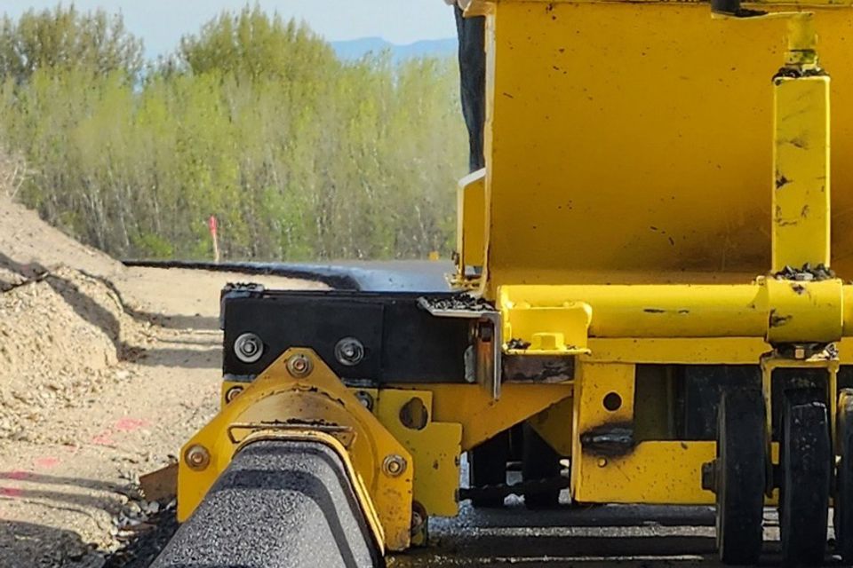 Asphalt curbing cropped more