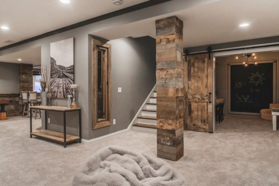 Finished basement stone column staircase