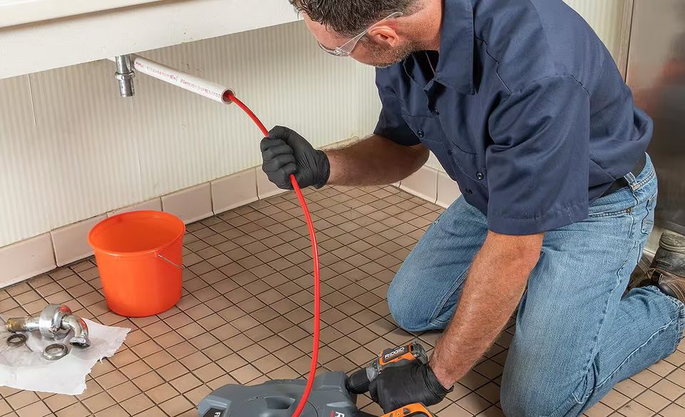 How to use a plumbing snake step 6