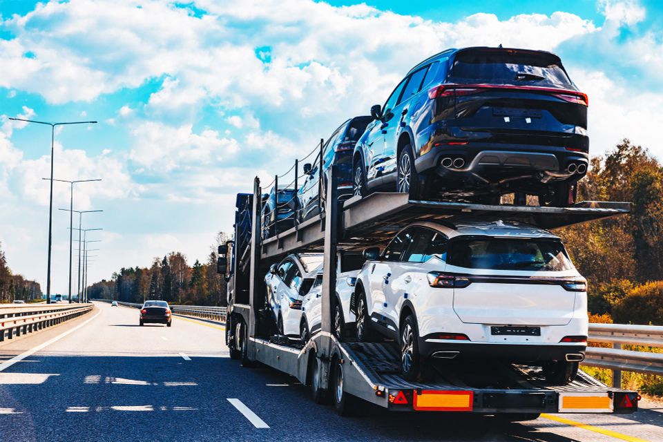 Car transport truck driving on highway road car c 2024 09 23 16 39 30 utc