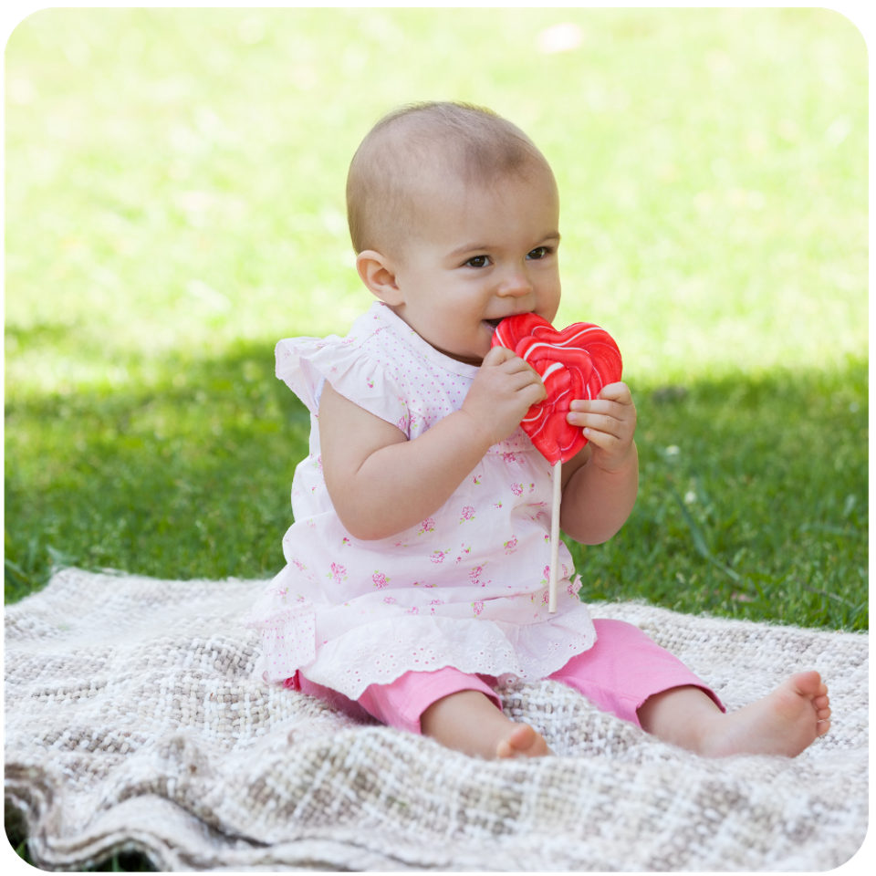 Hhcl infant on mat outise with 