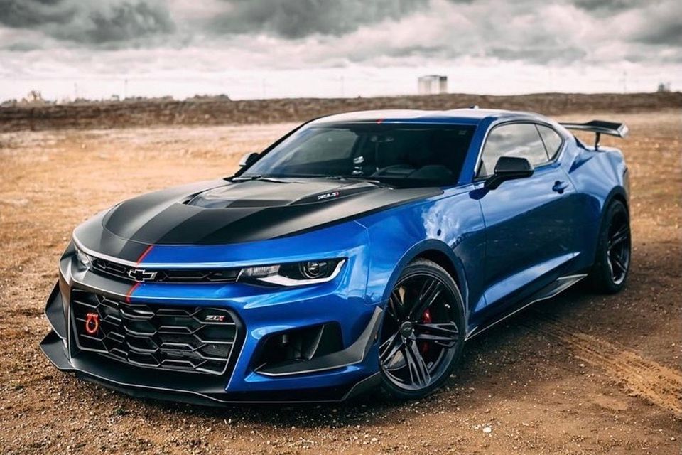 Image of blue & black Chevrolet Camaro.