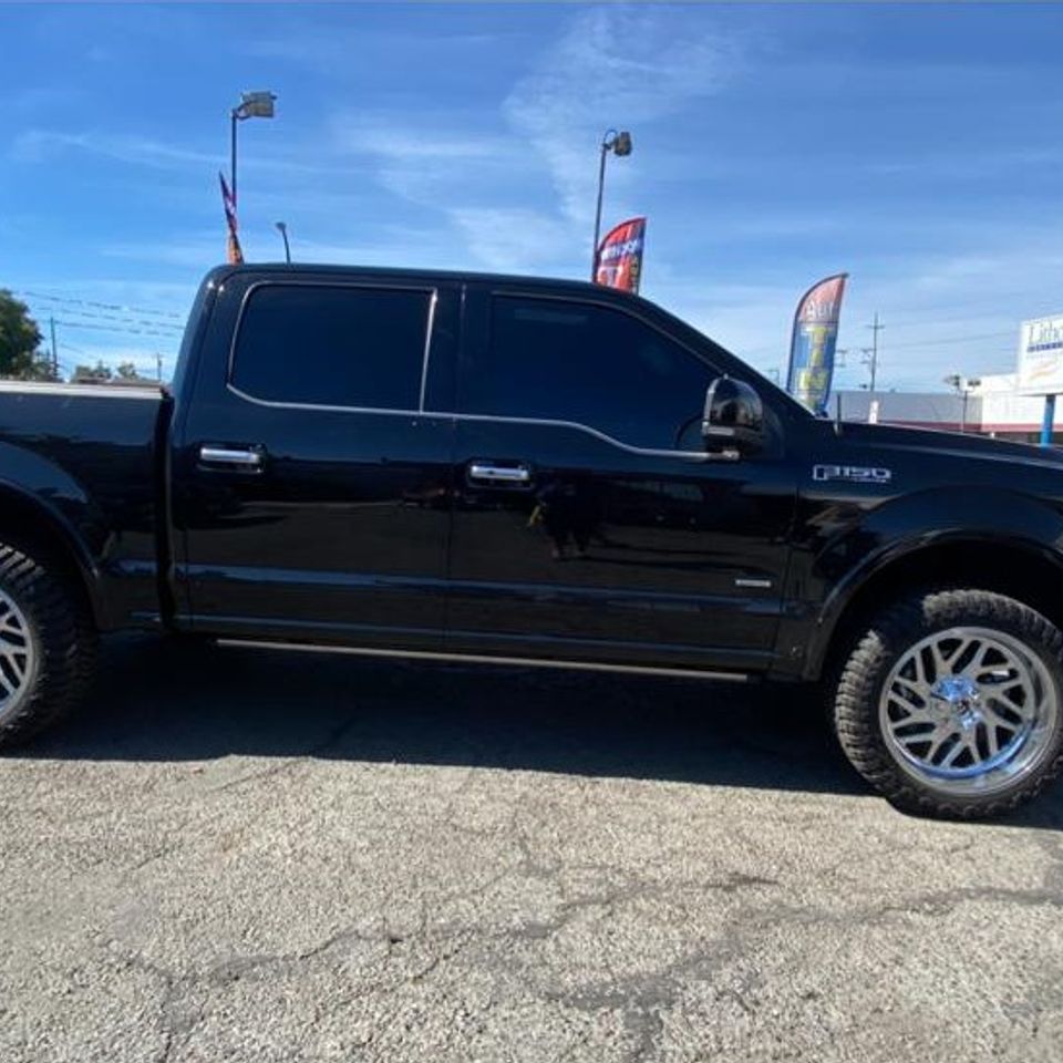 Black Ford F150 Pickup Truck in a Gallery Photo