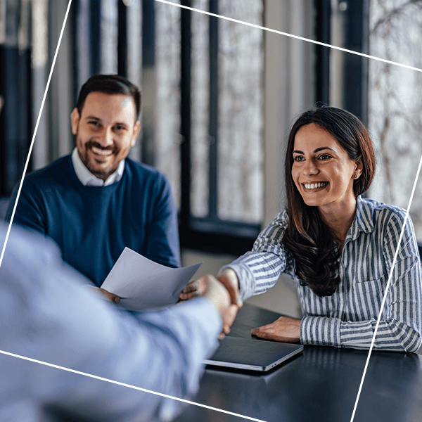 Women shaking hands with new hire