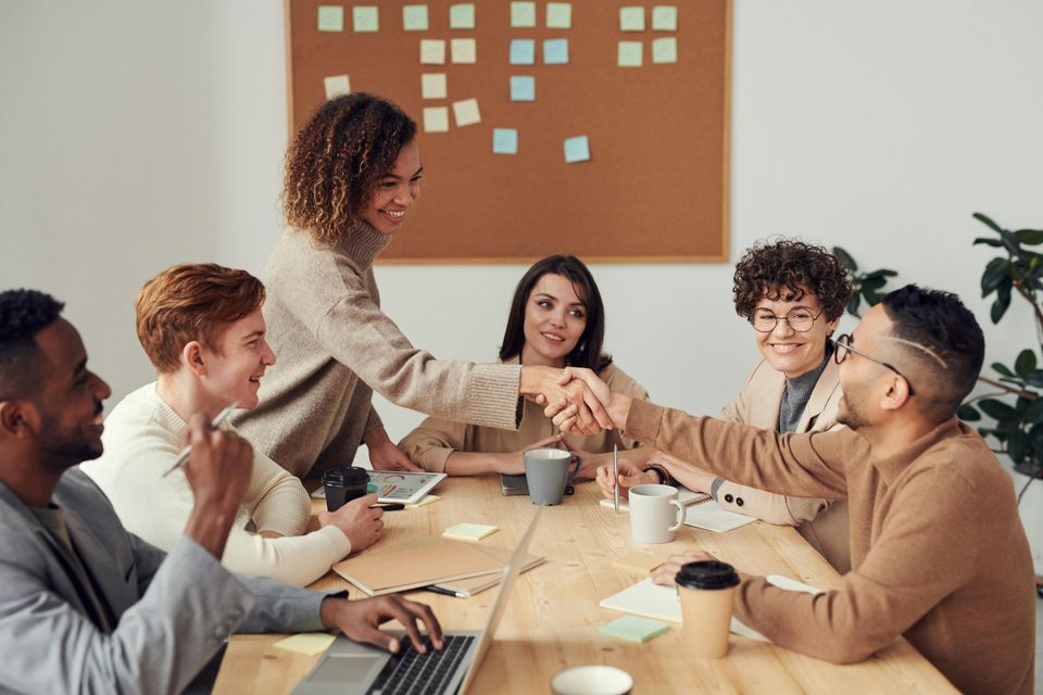 meeting of people around table