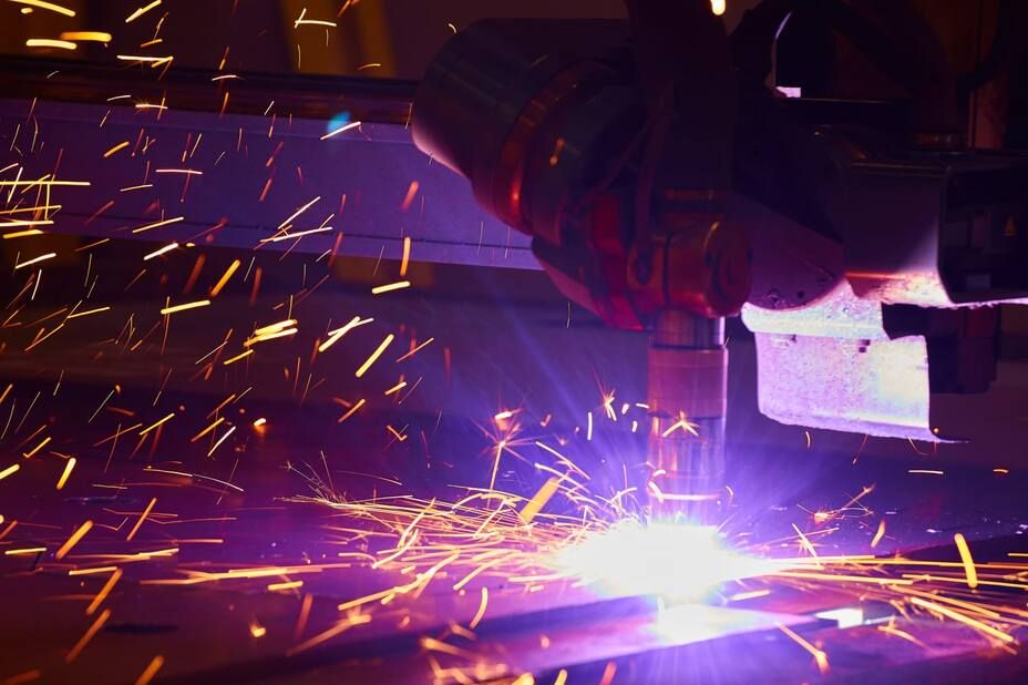 metal with sparks, a metal fabricator creating a commercial metal project