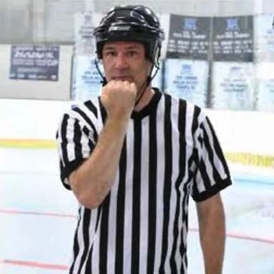 Referee grabbing face mask.jpg