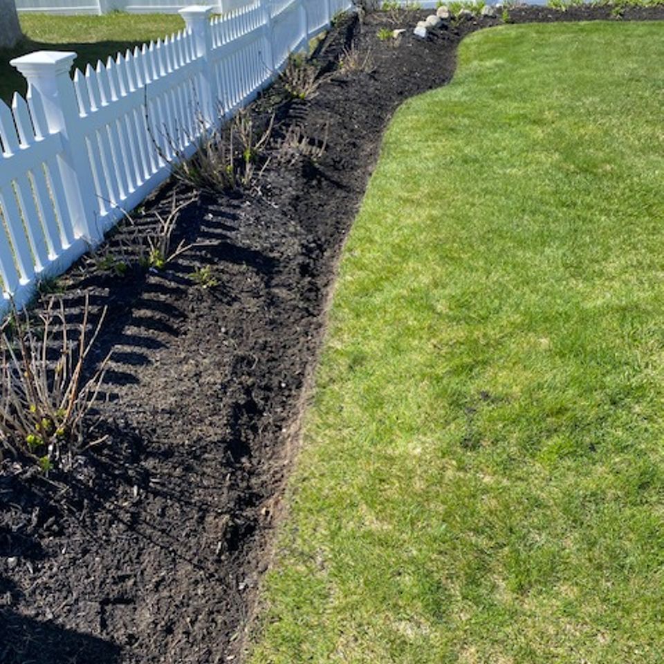 Sullivan mulch backyard fence before