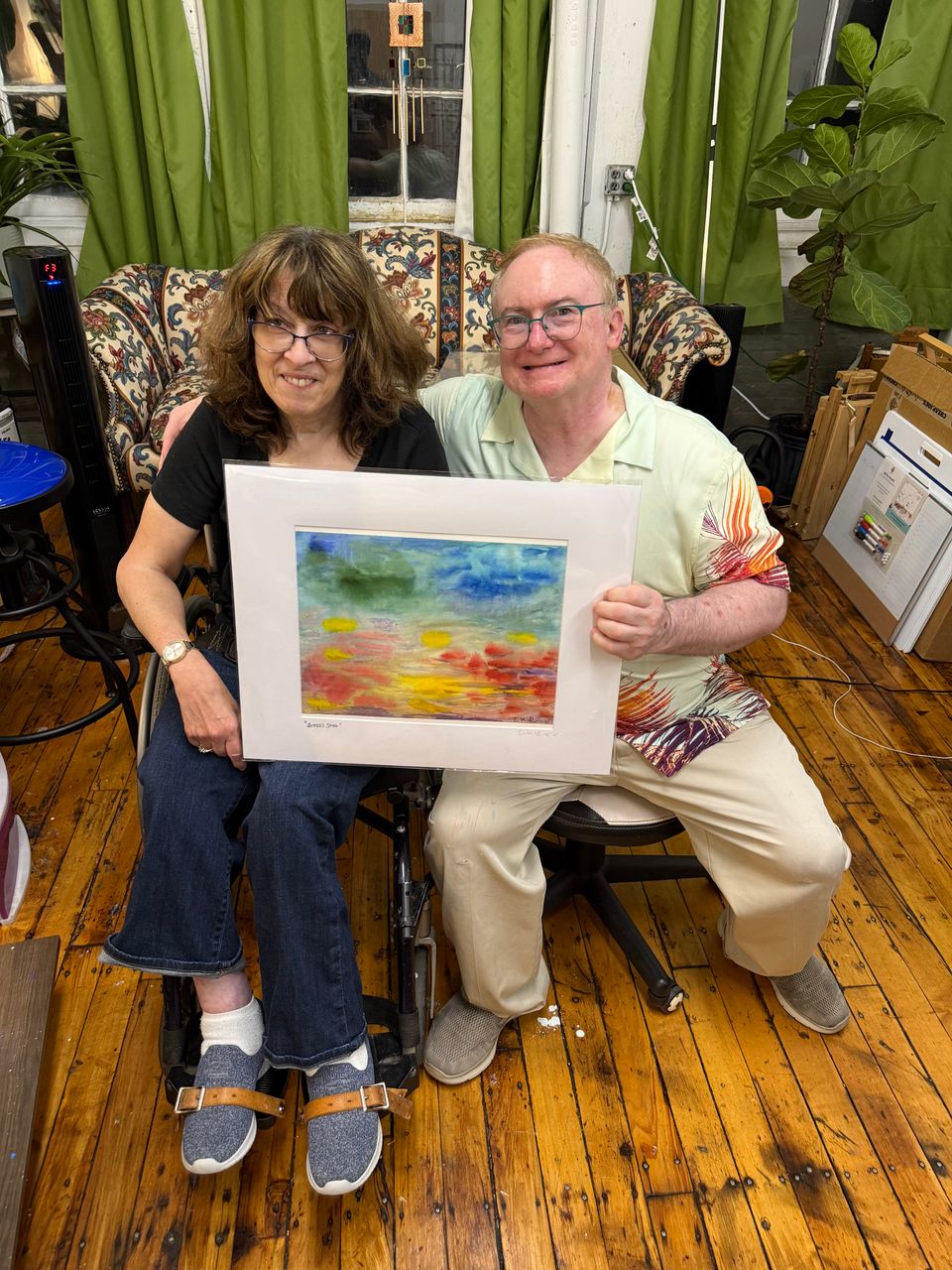 Eric Volkin with his wife, who uses a wheelchair, in Studio 16