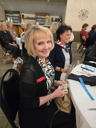 Kathy shook wins 50 50