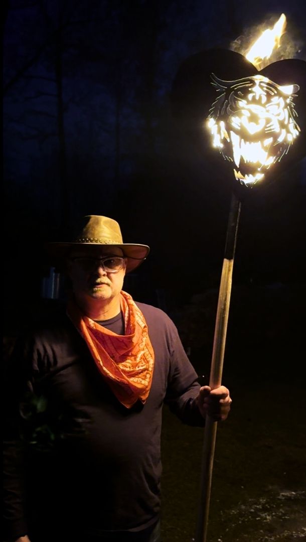 Dennis Narlock leading a group fire walk