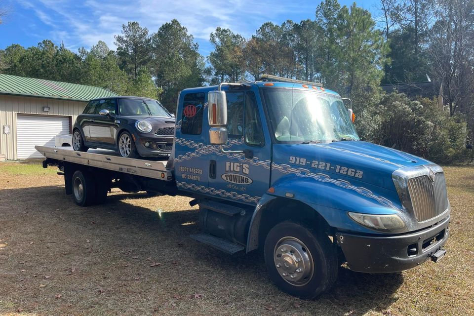 Figs towing blue truck 2
