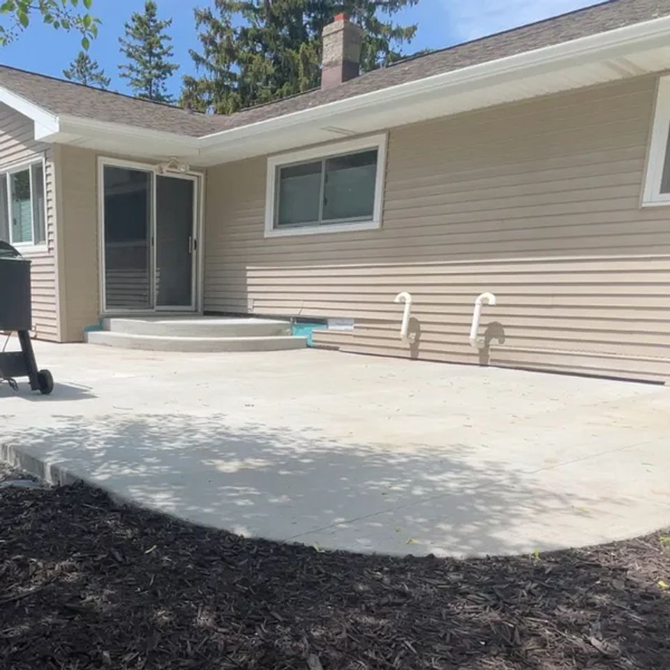Professional concrete slab installation for driveways patios and foundations