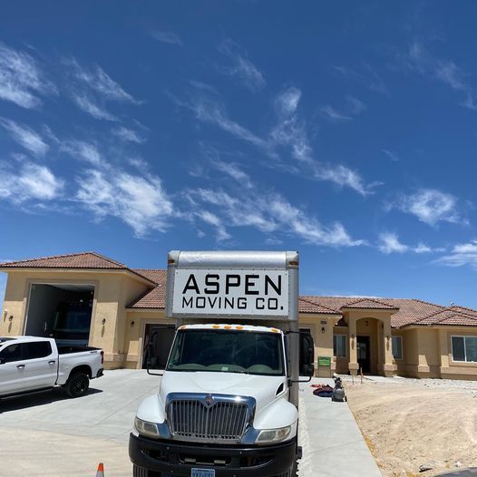 Aspen moving truck in front of house
