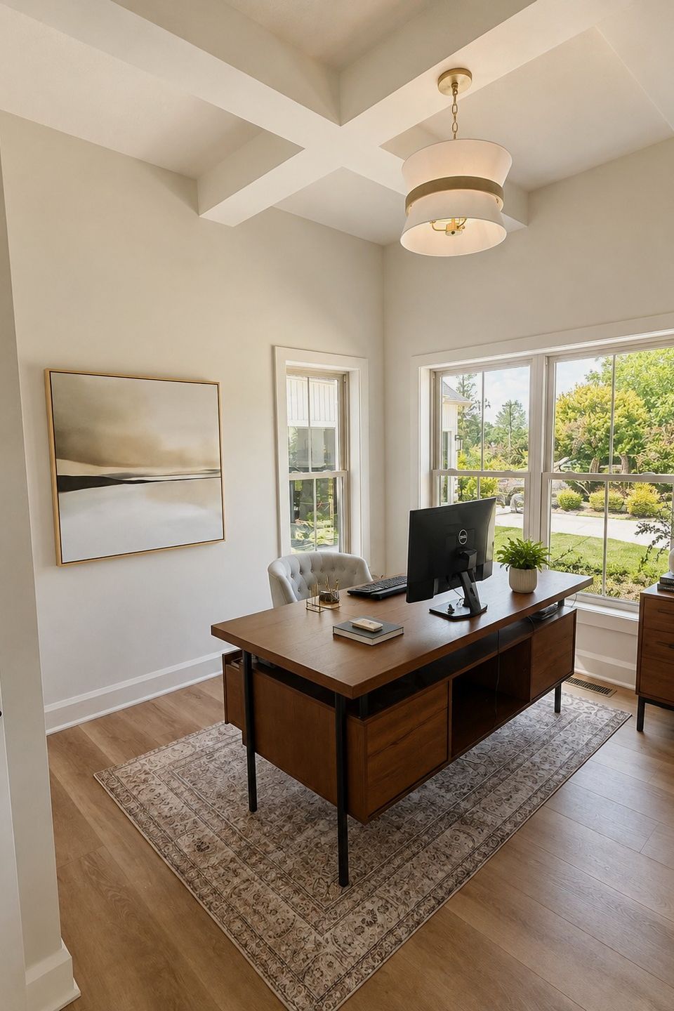 Custom home office with large windows and wood flooring in a Hudson, Ohio home