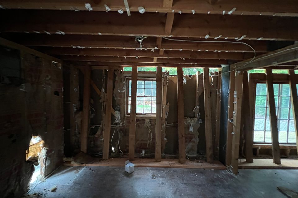 Original sunroom exterior before whole-home renovation in Chagrin Falls Ohio