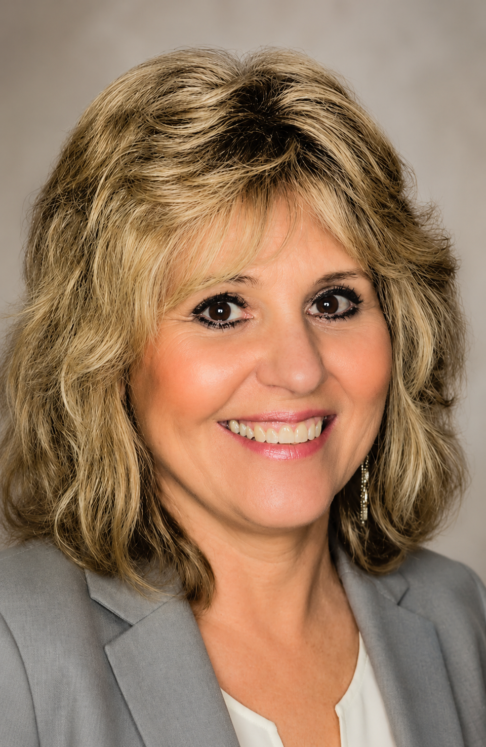 Janis esposito professional headshot with welcoming smile