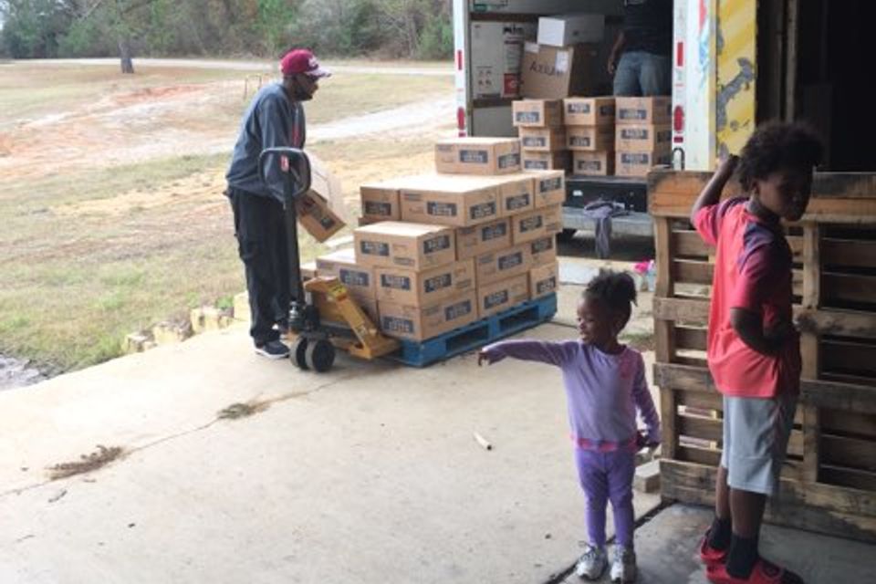 Youth volunteering in the wearhouse
