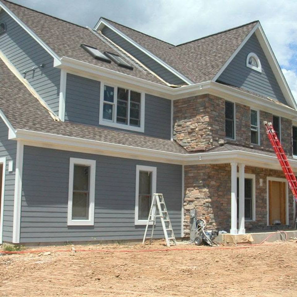 Home siding installation in progress