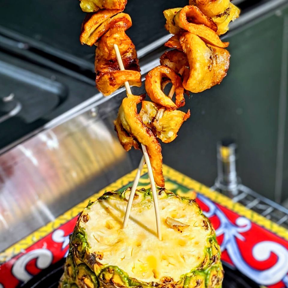 Ma maebelle's one love cafe fried plantains on a stick pineapple