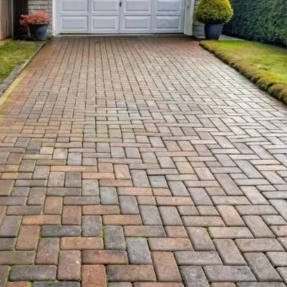 Shining driveway paver after power washing bergen county nj