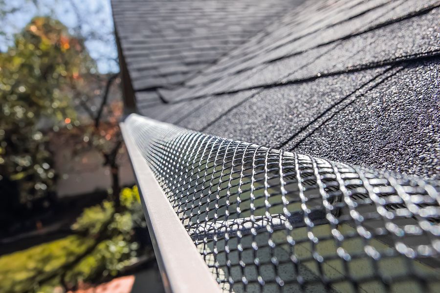 Bigstock plastic guard over gutter on a 418591738