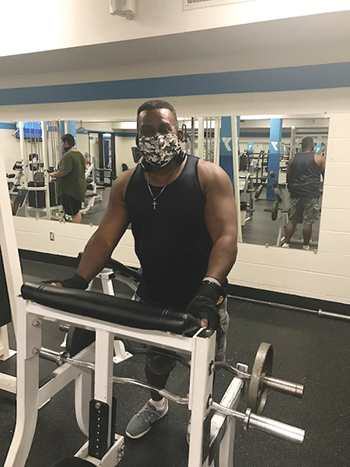 Ymcaweight lifter with mask
