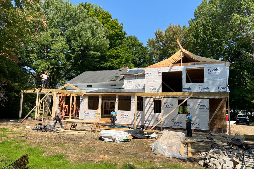 Framing and structural addition work during Chagrin Falls home renovation project