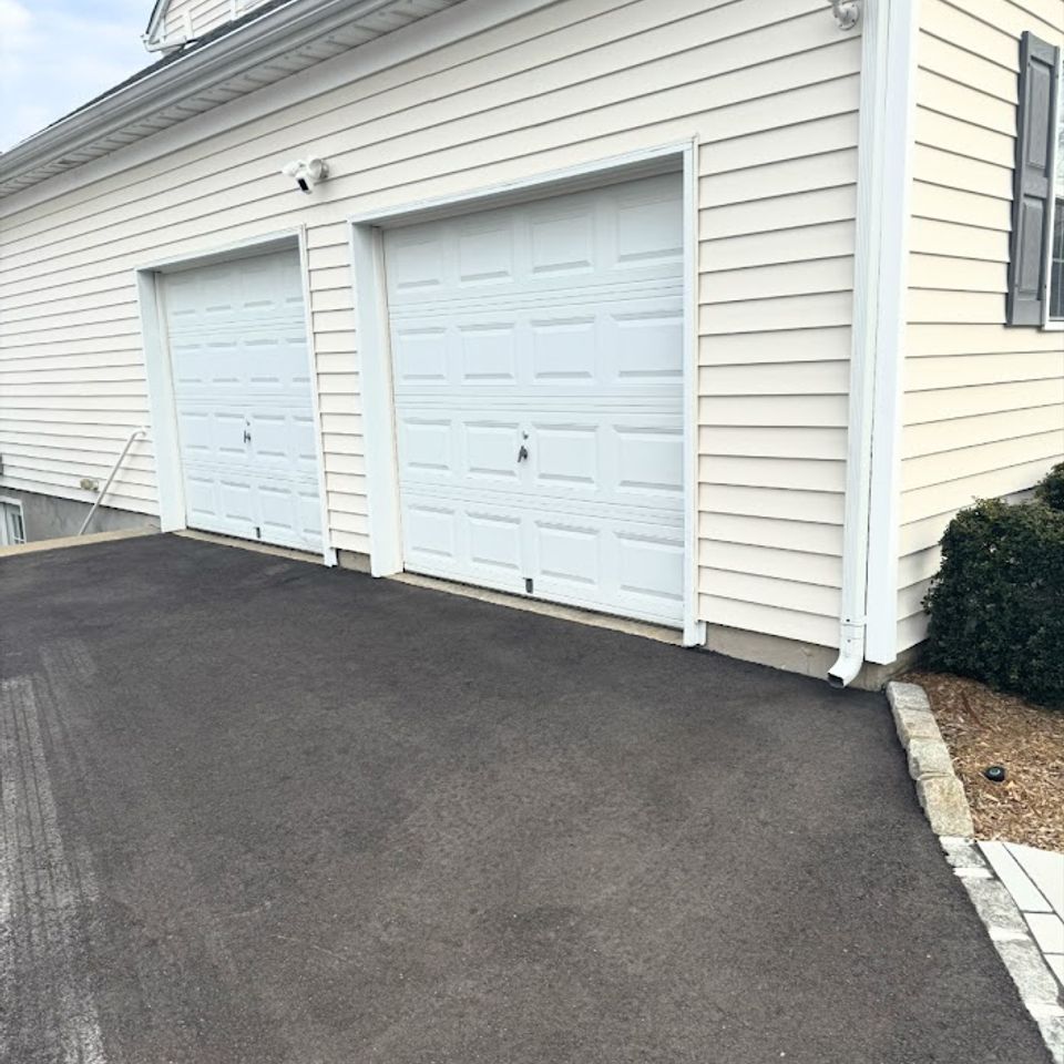 House siding, 2-car garage, done by Taurus Contracting Inc. of Suffolk County, NY