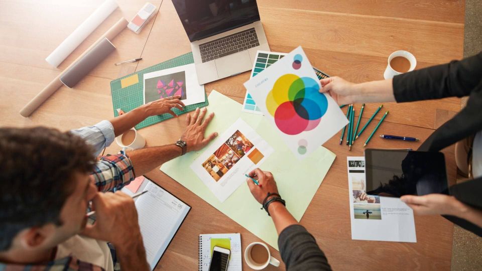 Young designers discussing the color palette picture id842214470 1 1