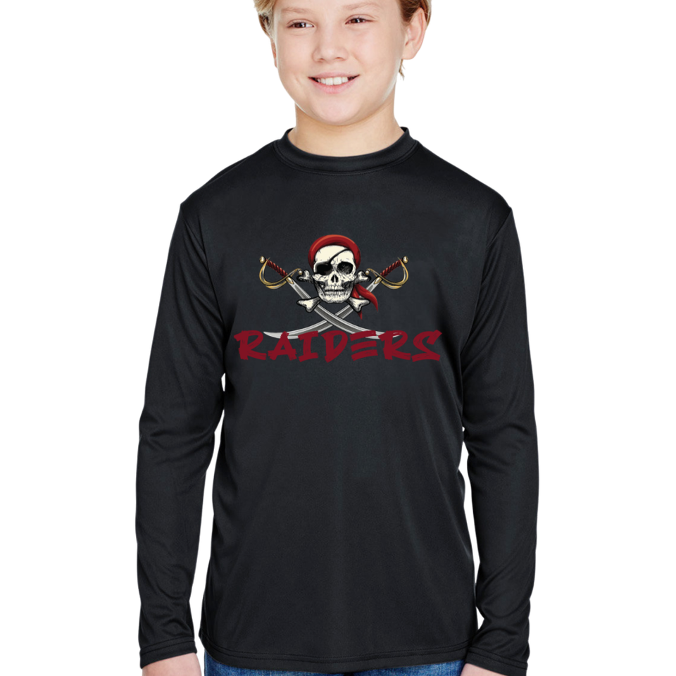 Youth model wearing a black long-sleeve performance shirt with a Raiders pirate skull and crossed swords graphic on the front.