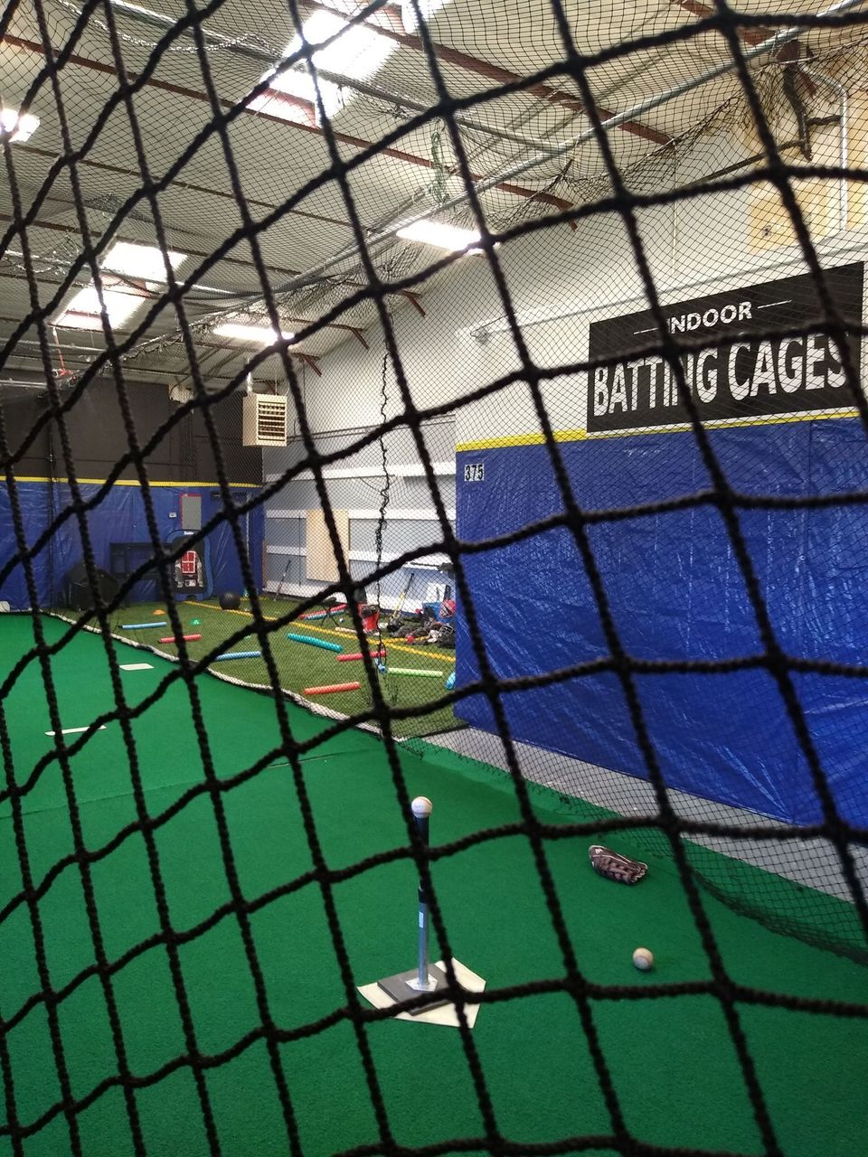 Indoor batting cage hitting cage