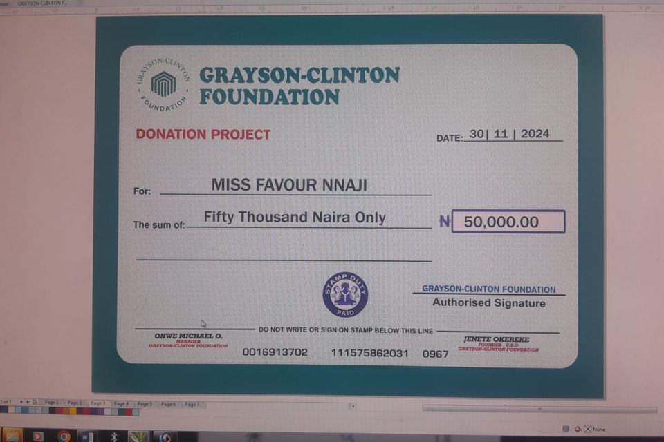 Donation cheque   miss favour nnaji