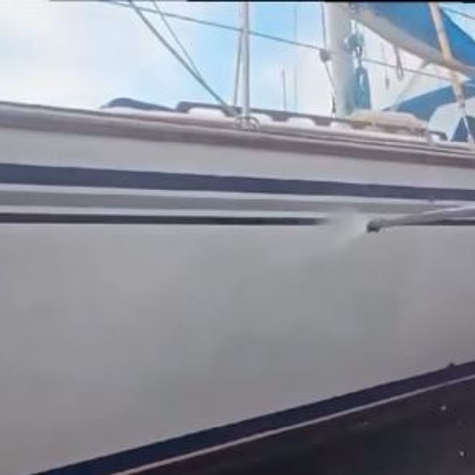 A dirty boat in need of detailing and pressure washing