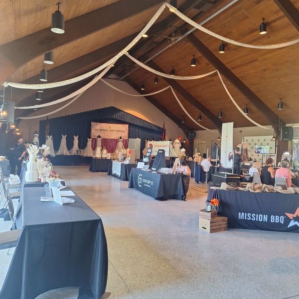 Poppin Cocktails participating in a bridal show at the Youngstown Saxon with vendor booths and event displays