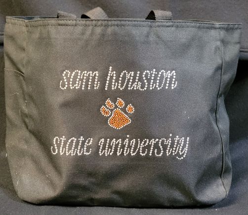 Rhinestone Bling tote bag example with rhinestones used in paw print design with wording Sam Houston State University 